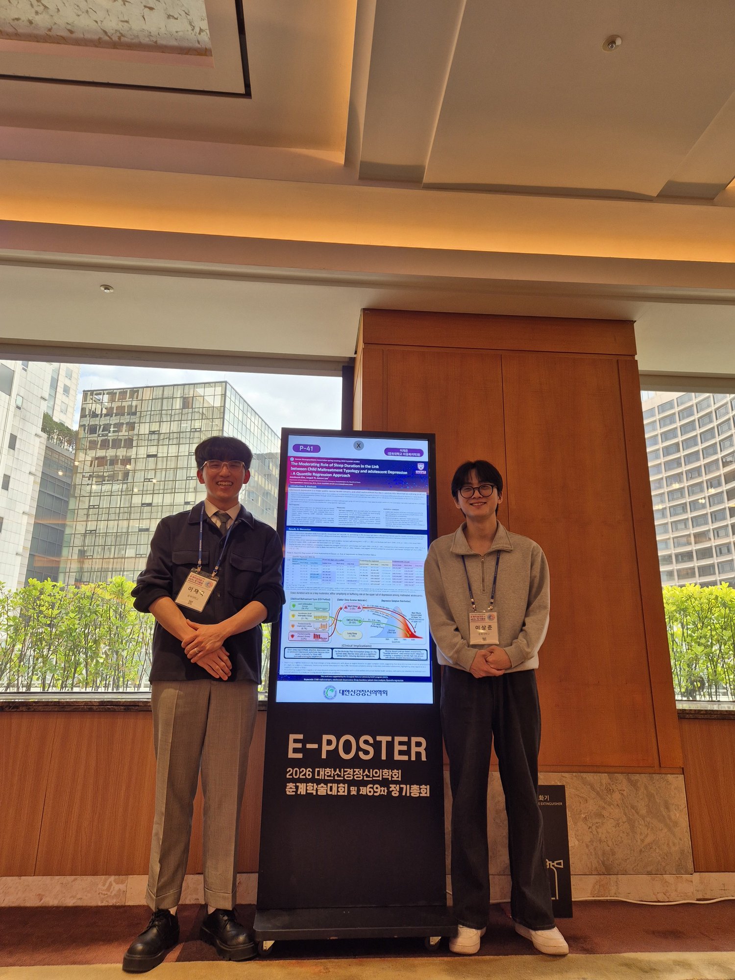 AIR Lab members with E-Poster at KNPA 2026